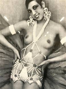 Josephine Baker Black & White Gelatin Photo Print: Possibly a gelatin silver print Framed back and white gelatin silver print of a Joséphine Baker wearing a body piece that starts at her neck and extends to around her waist and large feathers behind