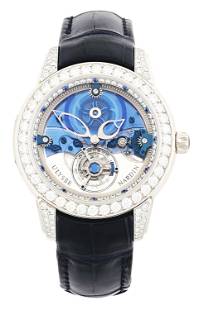 ULYSSE NARDIN ROYAL BLUE MYSTERY TOURBILLON L/E #1/99 PLATINUM DIAMOND WATCH W/B&P.: Exceptionally rare and important Ulysse Nardin Royal Blue Mystery Tourbillon limited edition platinum, diamond and sapphire wristwatch, Reference No. 799-93. This watch was limited to a total of only