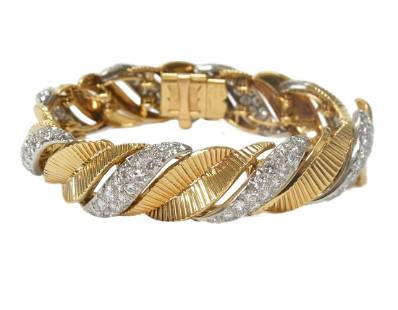 Signed Cartier 8ctw Fine Diamond 18k Gold Midcentury Signed Leaf Motif French Made Bracelet: Title: Signed Cartier 8ctw Fine Diamond 18k Gold Midcentury Signed Leaf Motif French Made Bracelet Description: A genuine 18k gold & diamond statement piece made in France by Cartier. The articulated