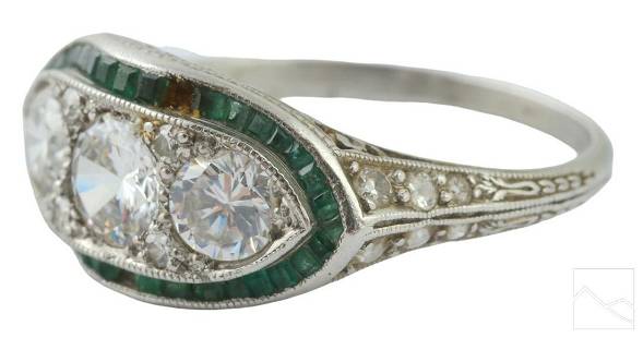 Art Deco Platinum Emerald & Gemstones Ring Sz 6 4g: A classic Art Deco design fine filigree mount featuring three round cut white stones, flanked by single cut diamond accents. Approximately .20 carats of accent diamonds. Further enhanced by Approximat