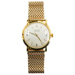 Tiffany & Co.14K Gold Men's Watch: DESCRIPTION: Tiffany & Co.14K Gold men's watch. Marked on dial with "International Watch Co. Schaffhausen" and "Tiffany & Co.". With a handwritten engraved inscription on verso that reads: "Morris Lev