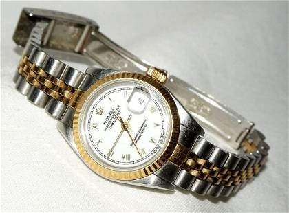 1980s Rolex DateJust Woman's Wristwatch Stainless & Gold & White Dial (FeD): Up for sale from a recent estate in Honolulu Hawaii, this classic and elegant Vintage 1980s woman's date just white dial and stainless steel and yellow gold band wrist watch by well known maker Rolex.