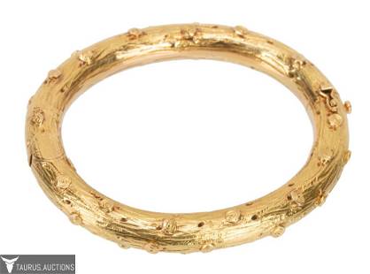 Tiffany & Co.18K Bamboo Bangle Bracelet Italy: Item/Description: Exquisite Tiffany & Co. bangle bracelet. Expertly crafted in 18K yellow gold. Crafted as a rounded branch of bamboo wood. Organic design with wonderful detail. Push-button hidden clo