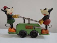Mickey & Minnie Mouse on Lionel Had Car No. 1100: 8" Long. Says "Mickey Mouse Hand Car Walt Disney The Lionel Corp. NY." No. 1100. Made in US of America". Moves Freely.